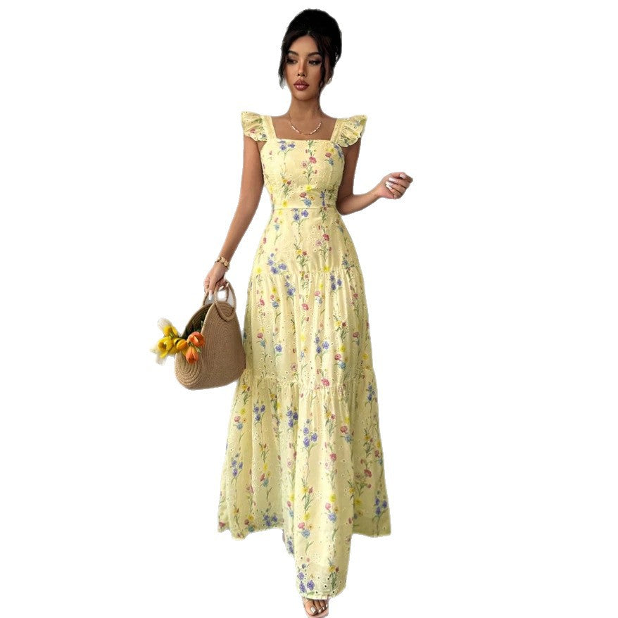Abito donna floreale stile francese, romantico e leggero, con motivo a fiori delicati, ideale per l'estate.
