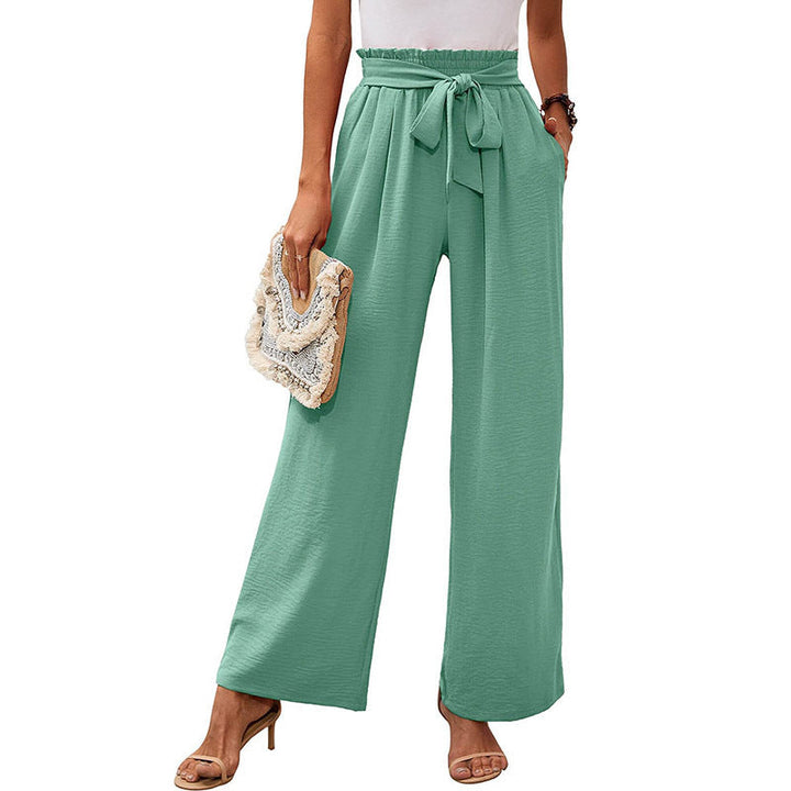 Pantaloni donna a gamba ampia, vita alta con nodo. Eleganza versatile, moda donna.