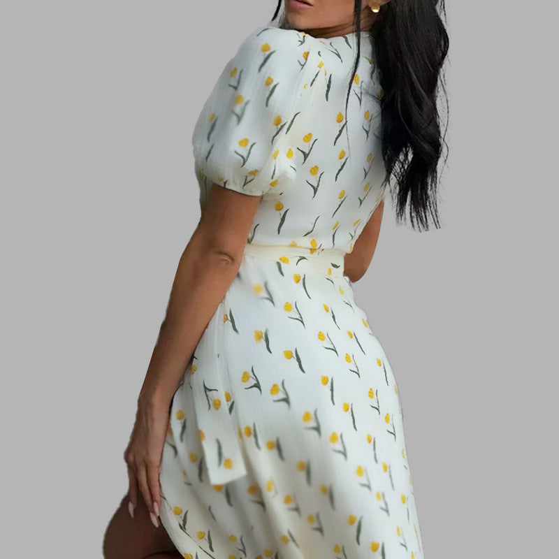 Vestito midi floreale estivo donna, scollo a V, tessuto leggero e fluido. Perfetto per il comfort e stile estivo.