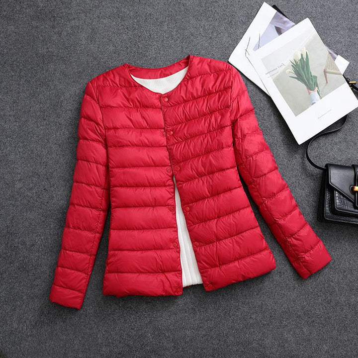 Giacca isolante donna, scollo rotondo, per comfort autunnale e invernale, stile casual.