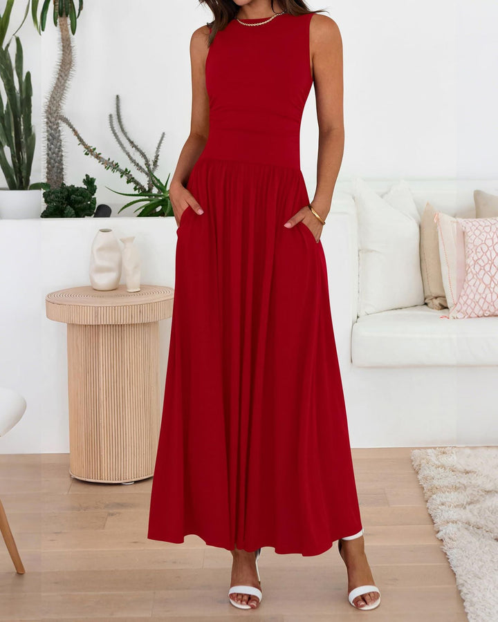 Abito lungo donna in stile fluido con tasche. Eleganza e moda femminile estiva per comfort e tendenza.