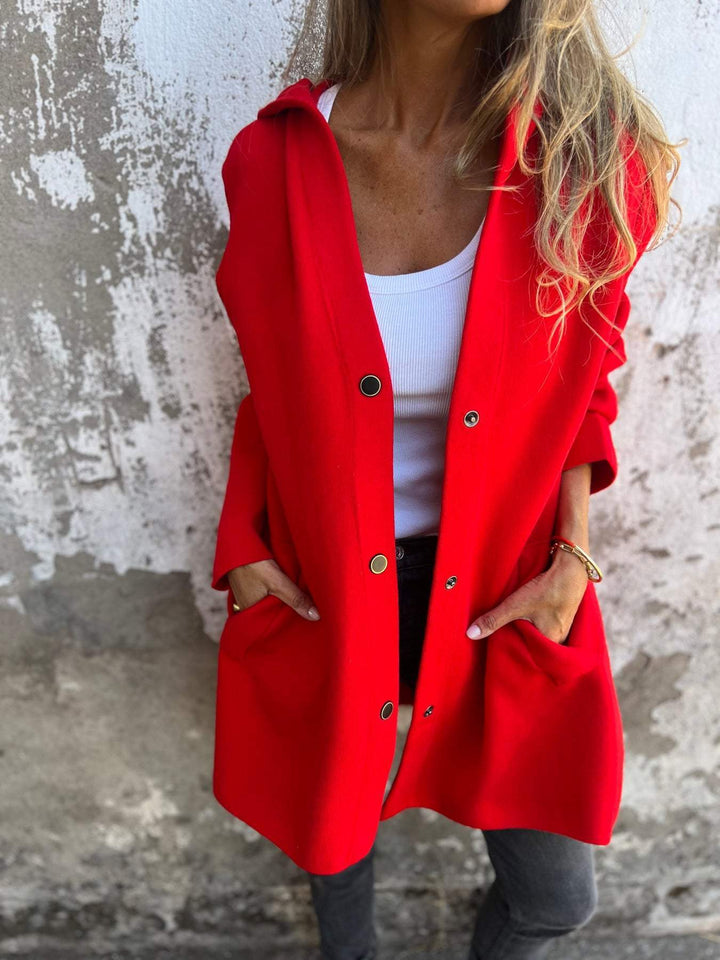 Cardigan donna con cappuccio e chiusura a bottoni, per comfort quotidiano e stile.