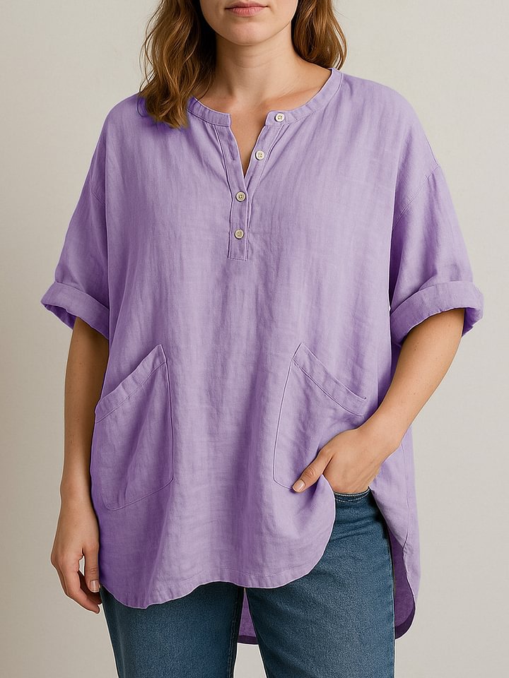 Camicia estiva da donna a manica corta con scollo a V e vestibilità ampia. Offre comfort e stile casual/elegante.