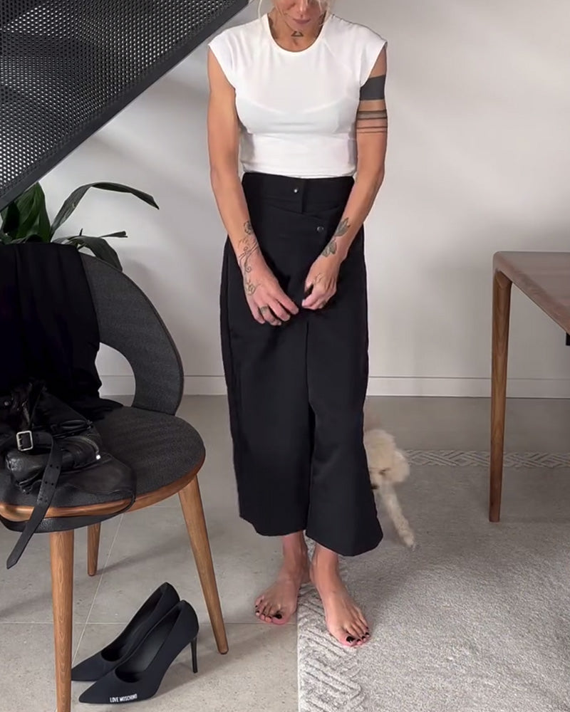 Pantaloni larghi da donna asimmetrici con vestibilità confortevole e vita media, colore nero.
