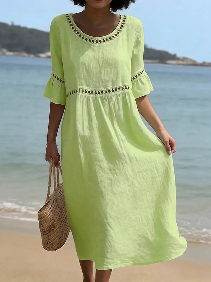 Abito elegante midi per donna, con effetto modellante contenitivo. Valorizza la figura con grazia e stile unico.
