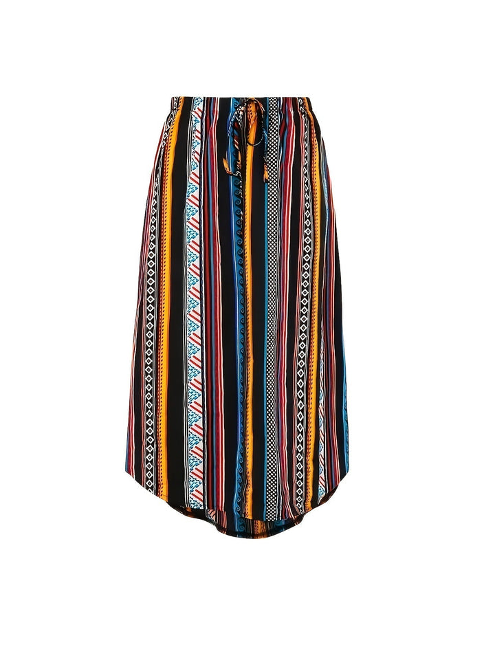 Dettaglio gonna midi donna asimmetrica con fantasia geometrica dinamica, un capo moda moderno e accattivante.