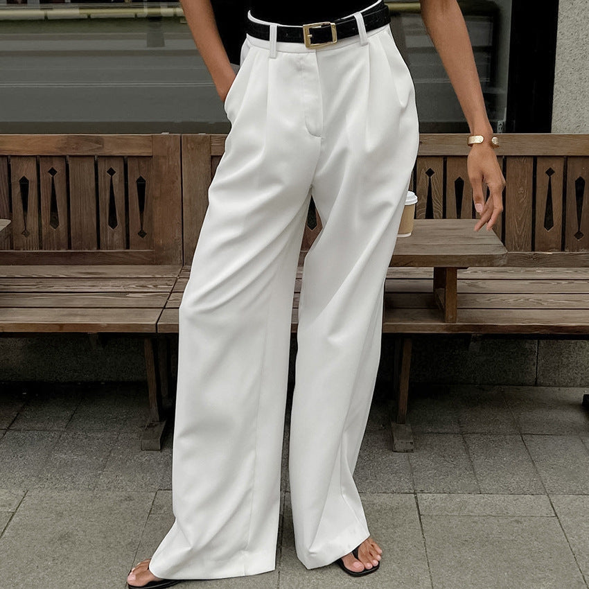 Moda donna: pantaloni vita alta, gamba dritta ampia. Versatili per ufficio, casual, look sofisticato.