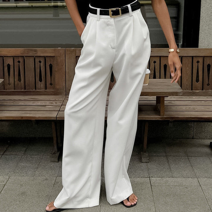 Moda donna: pantaloni vita alta, gamba dritta ampia. Versatili per ufficio, casual, look sofisticato.