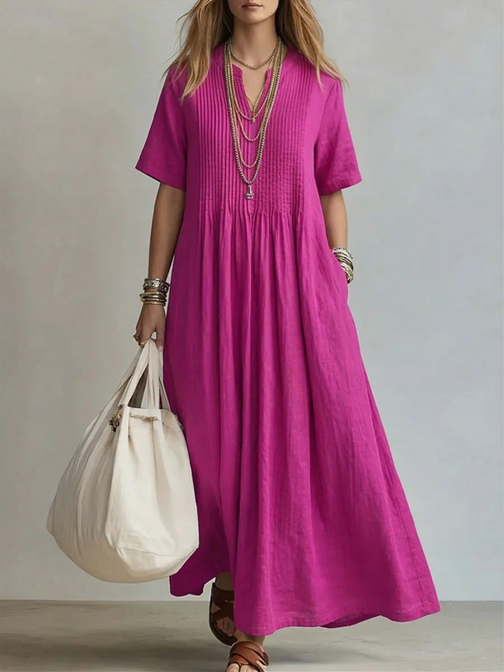 Abito plissettato donna elegante e leggero. Perfetto per un look raffinato in estate o occasioni speciali.