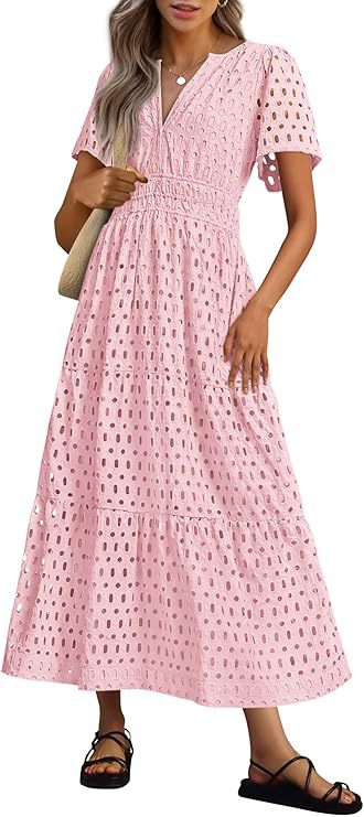 Abito donna fluido con scollo a V e maniche corte. Abbigliamento ideale per l'estate e il tempo libero.