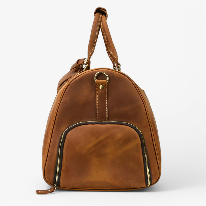 Capiente borsa da viaggio marrone con tracolla, perfetta per viaggi weekend e sport.
