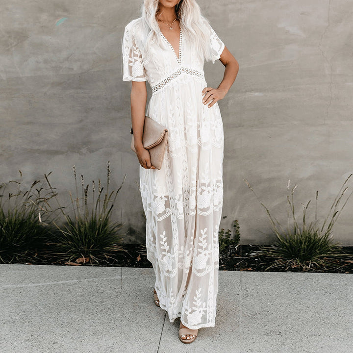Vestito estivo maxi boho chic da donna, scollo a V, maniche corte, look fluido per massimo comfort.