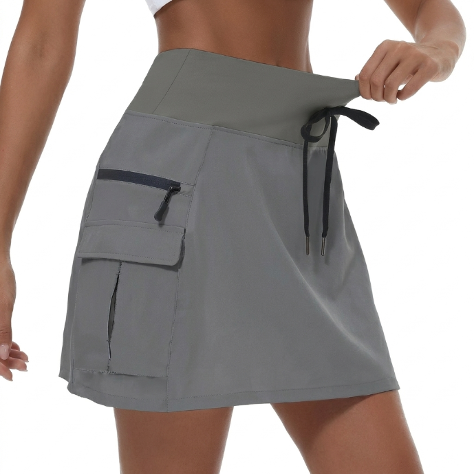 Gonna donna sportiva vita alta con shorts interni integrati, garantisce libertà di movimento per fitness e sport.