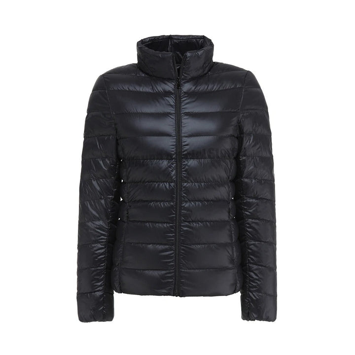Giacca trapuntata ultraleggera donna nera, calda e comprimibile. Ideale per l'inverno e i viaggi.