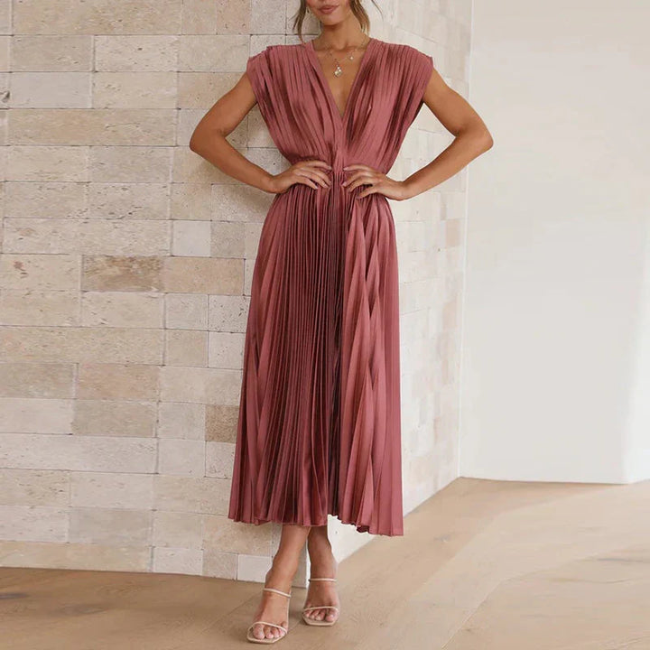 Moda donna: abito lungo elegante plissettato, vestito formale perfetto per serate e cerimonie con scollo a V.