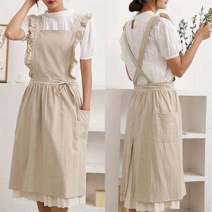 Grembiule da donna elegante con volant, perfetto per cucinare o hobby creativi.