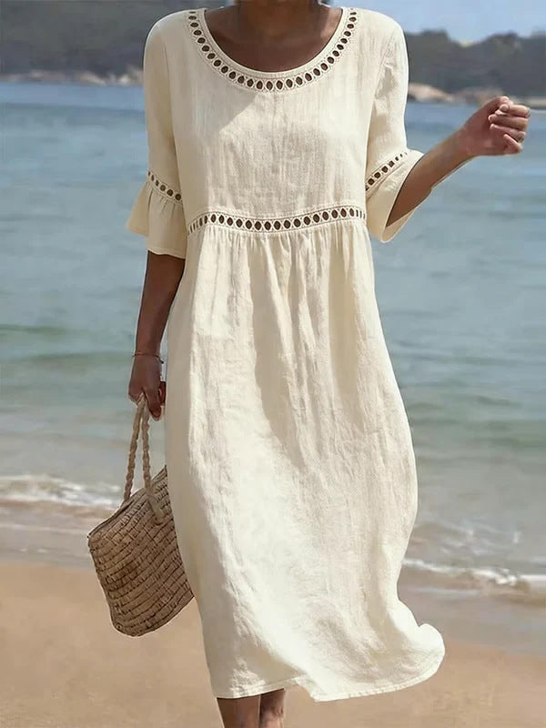 Raffinato abito midi contenitivo da donna, perfetto per esaltare la figura e aggiungere un tocco di eleganza.