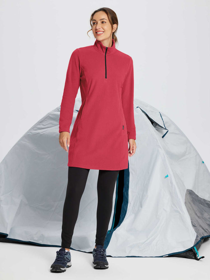 Abito tunica invernale donna. Design con mezza zip, collo alto e tasca. Per una moda versatile.