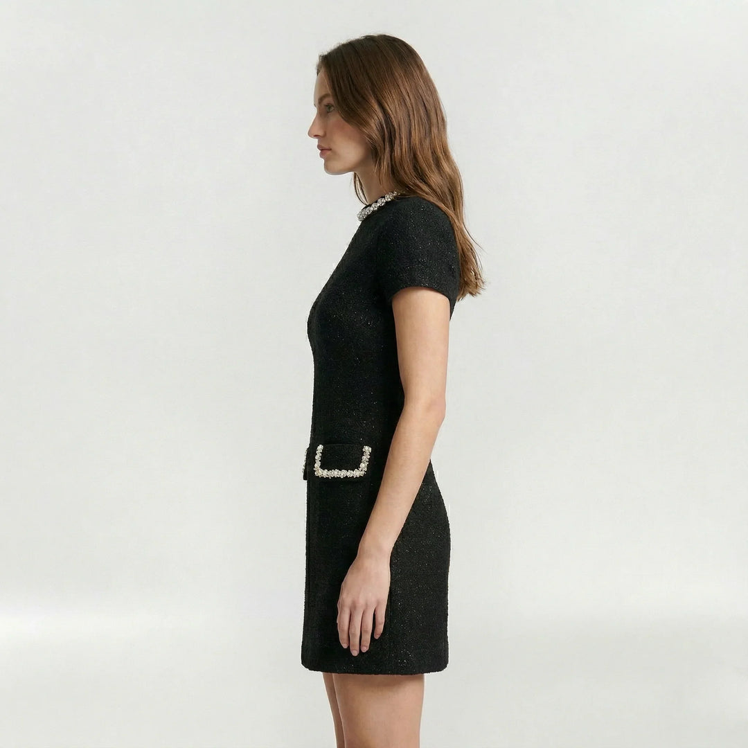 Vestito da donna nero, mini abito elegante con perle e tasche finte. Ottimo per cocktail, serate e occasioni.