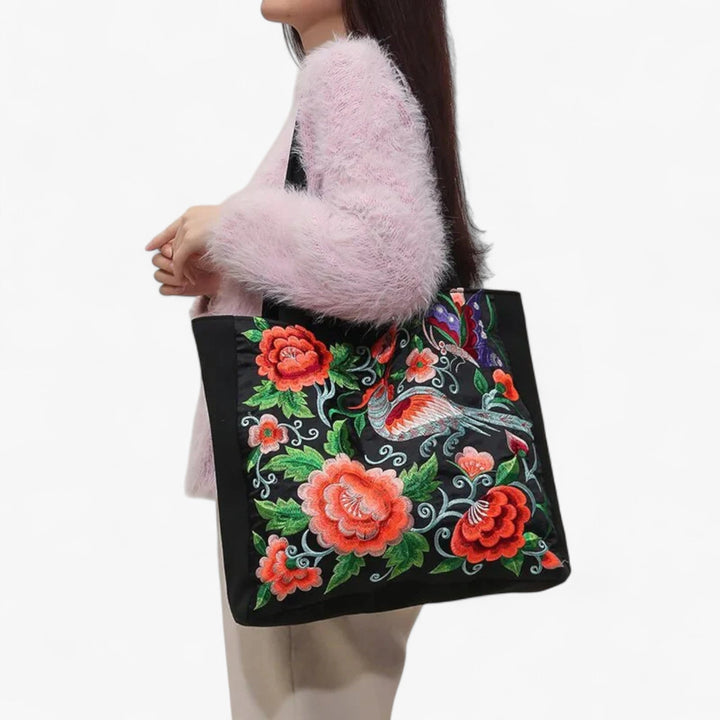 Elegante borsa tote donna multicolor con stampa floreale. Perfetta come accessorio primavera da viaggio.