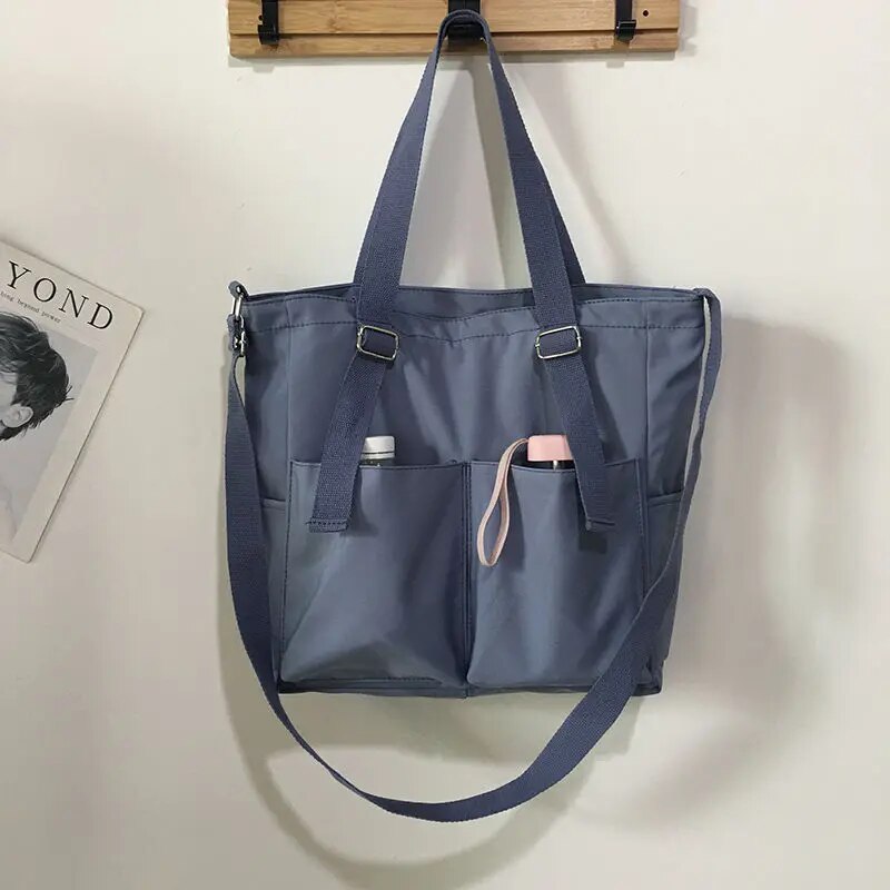 Borsa tote da viaggio donna multicolore, robusta e funzionale. Perfetta per ogni occasione, dalla spiaggia alla città.