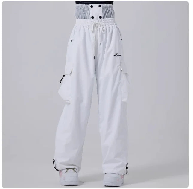 Pantaloni sci uomo impermeabili e antivento, taglio largo per snowboard. Ideali per sport invernali e neve.