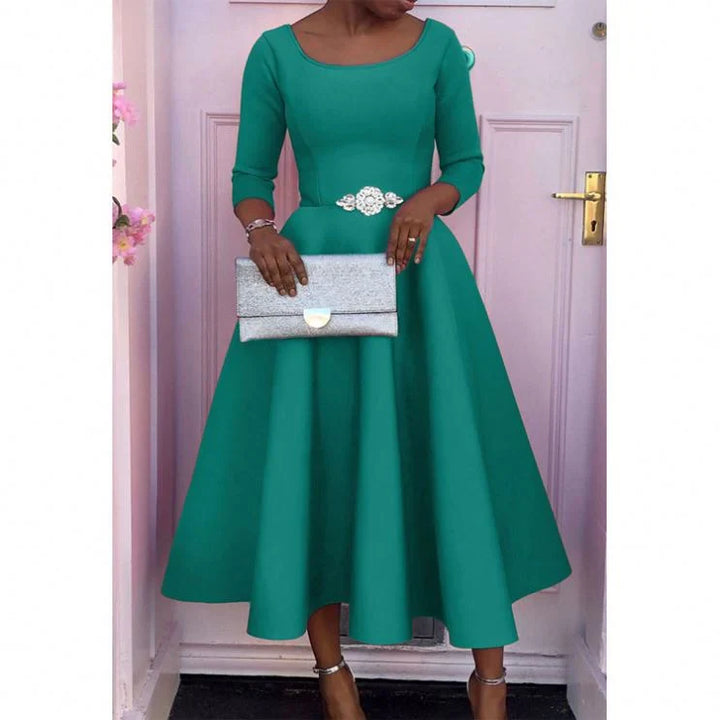 Elegante abito midi estivo da donna per serate speciali e occasioni formali primaverili.