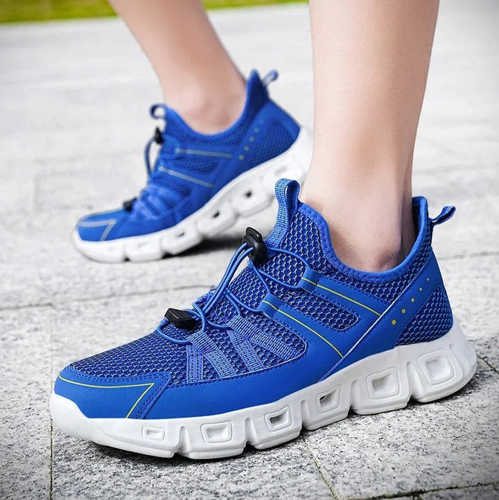 Scarpe da running uomo per allenamento, con trazione superiore e chiusura rapida innovativa.