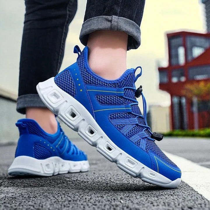 Scarpe sportive uomo da corsa, con chiusura rapida e comfort per lunghe distanze e allenamenti.