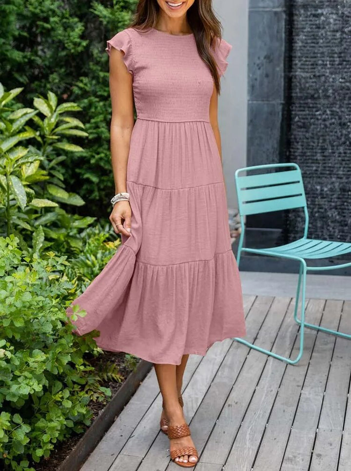 Abito nero midi donna con maniche a farfalla, un classico estivo elegante e senza tempo.