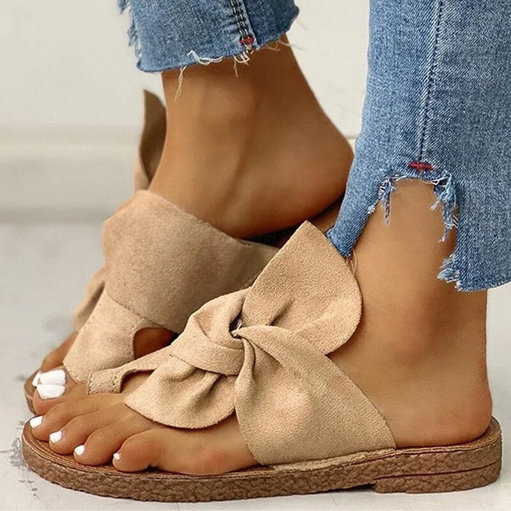 Mules donna comode con fiocco, sandali piatti estivi che uniscono eleganza e massimo comfort.
