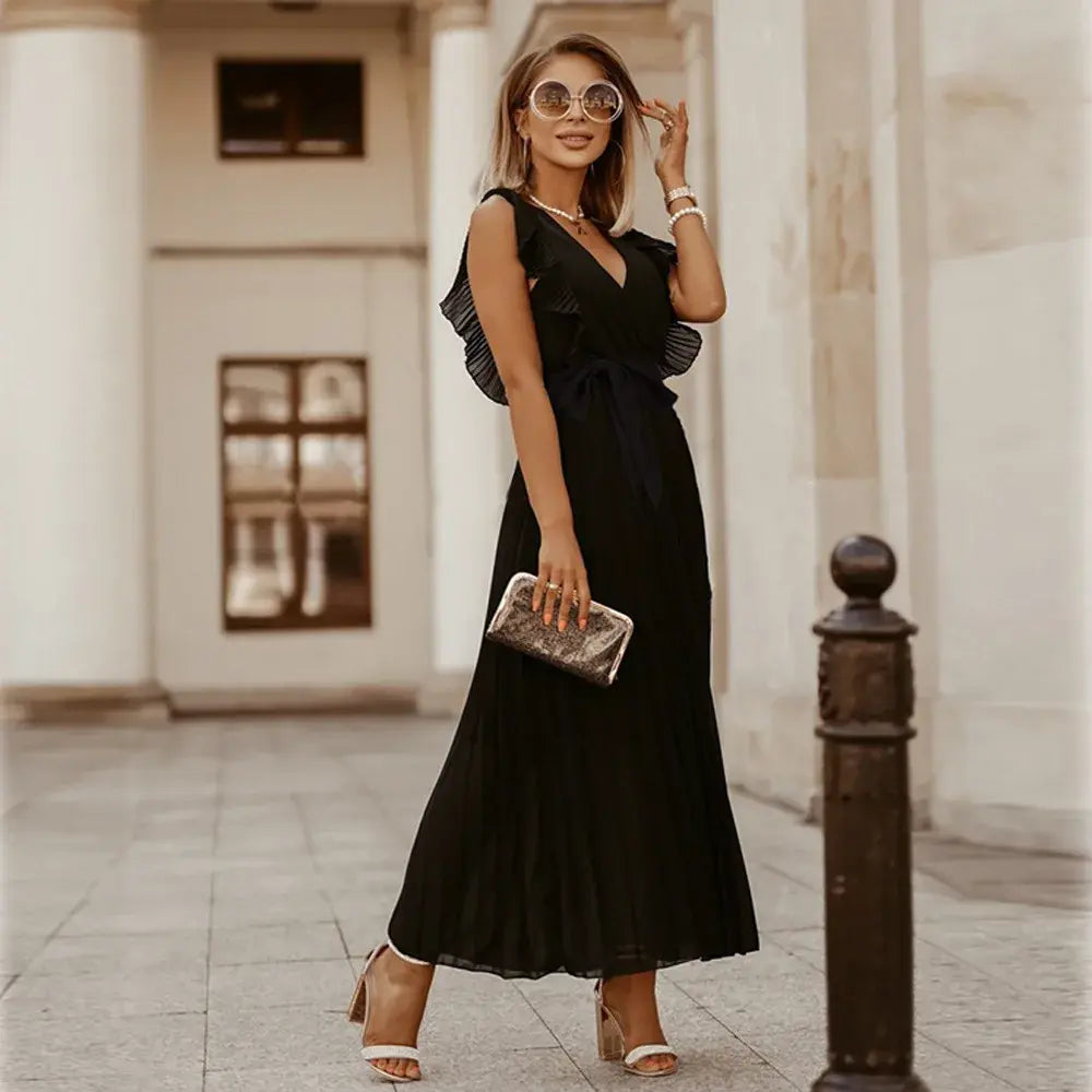 Abito maxi donna con texture fluida, scollo a V e volant, per un comfort estivo superiore.