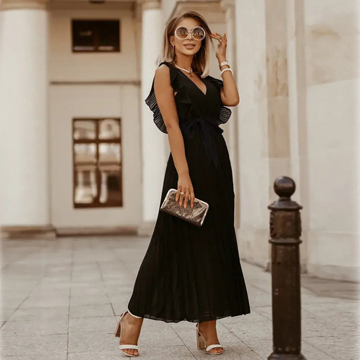 Abito maxi donna con texture fluida, scollo a V e volant, per un comfort estivo superiore.