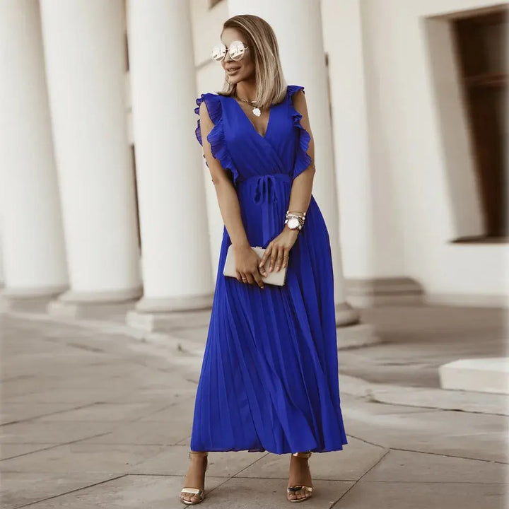 Abito maxi donna accessoriato, scollo a V, volant e senza maniche, per un outfit completo.