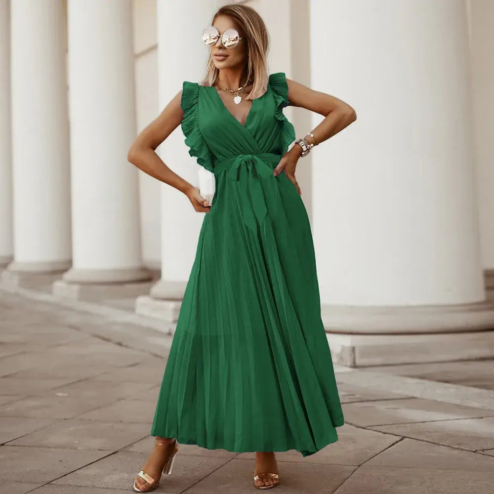 Silhouette abito lungo donna elegante, scollo a V e volant delicati. Valorizza la figura.