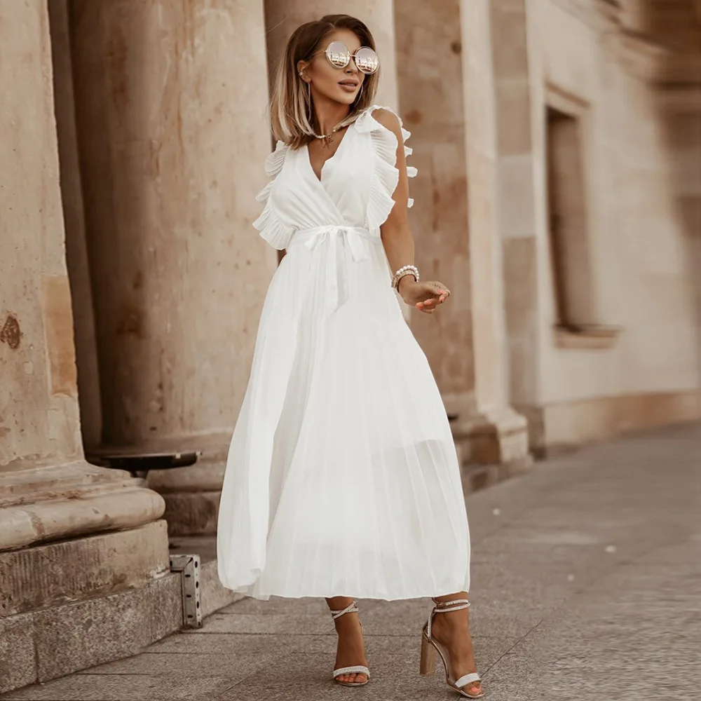 Maxi dress elegante da donna, scollo a V e volant, ideale per feste serali o cerimonie.