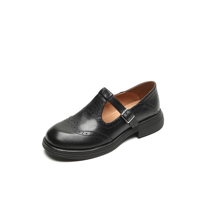 Scarpe Mary Jane da donna, modello casual-elegante. Disponibili nere e marroni, con cinturino e suola antiscivolo.