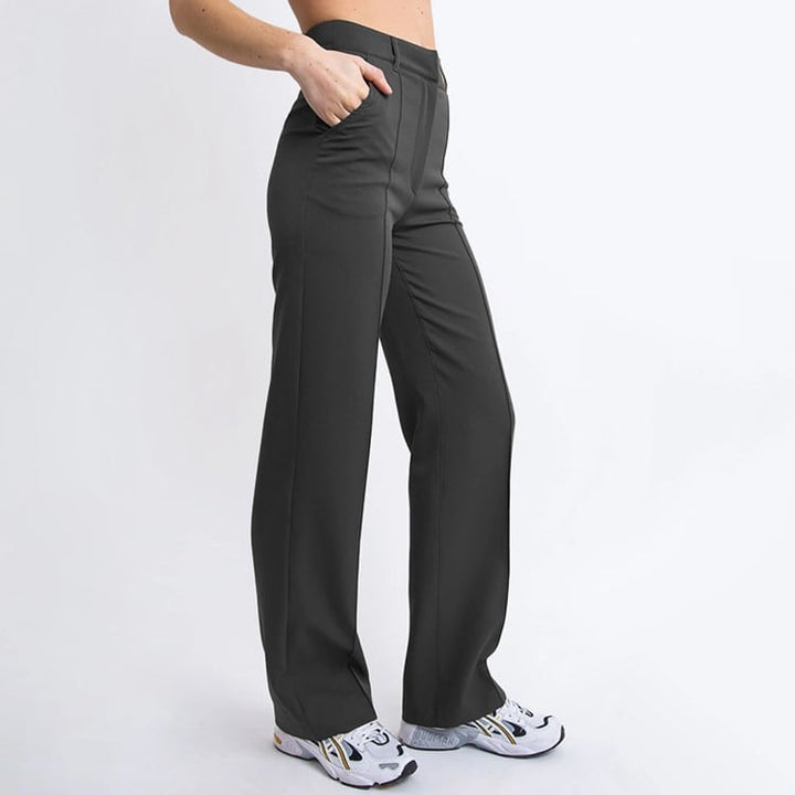 Abbigliamento donna: pantaloni a vita alta, gamba dritta. Eleganza e comfort per l'ufficio.