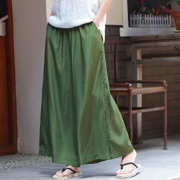 Pantaloni eleganti a gamba larga per donna, versatili per diverse occasioni.
