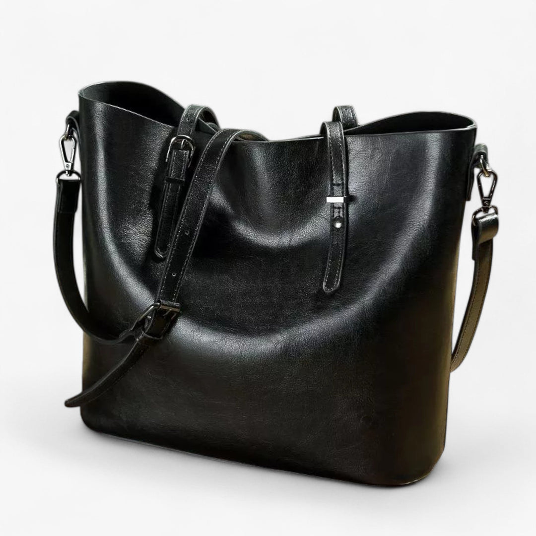 Interno spazioso di borsa tote donna marrone, perfetta per lavoro o viaggio, con scomparti utili.