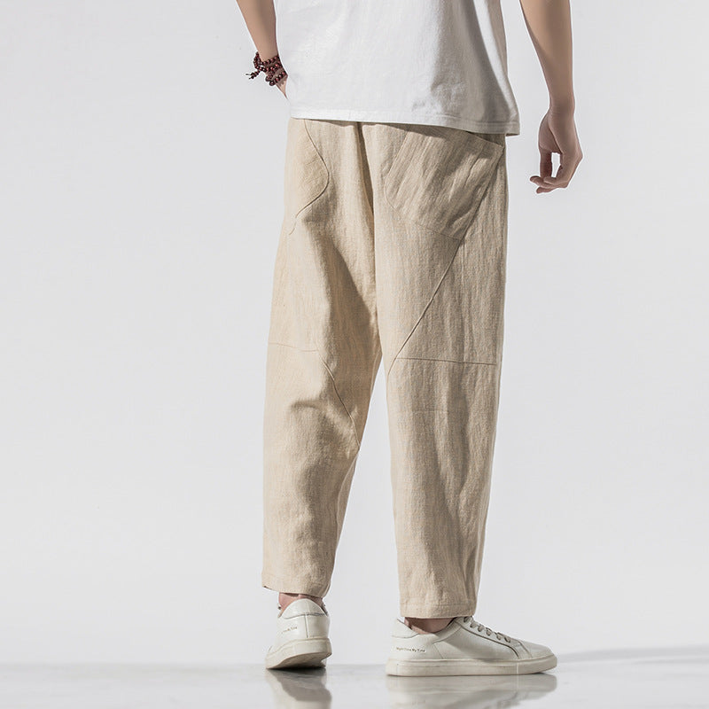 Pantaloni uomo casual a gamba larga, vestibilità rilassata alla caviglia, confortevoli per viaggi e tempo libero estivo.