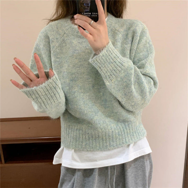 Maglione donna a maniche lunghe, scollo rotondo e vestibilità ampia. Pullover casual comodo per ogni outfit di moda.
