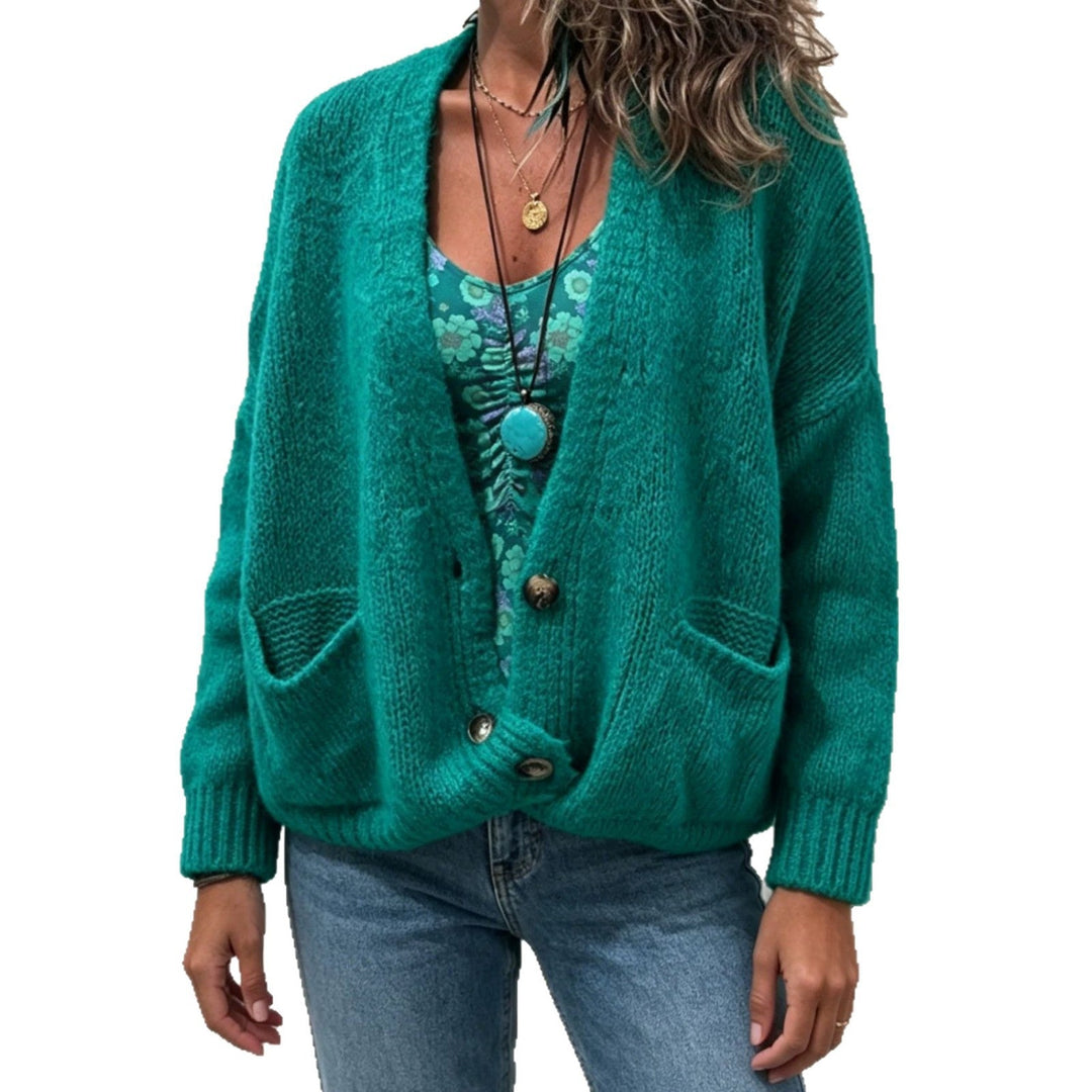 Cardigan donna oversize morbido e versatile, perfetto per aggiungere uno strato casual chic al tuo abbigliamento.