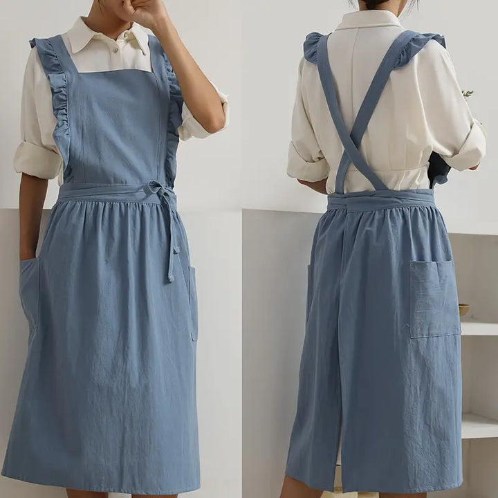 Elegante grembiule da donna con volant, ideale per cucina, giardinaggio e altre attività.