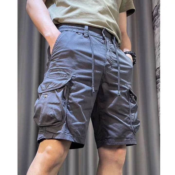 Salopette uomo utility a gamba dritta cropped. Design moderno con tasche per moda uomo primavera/tempo libero.