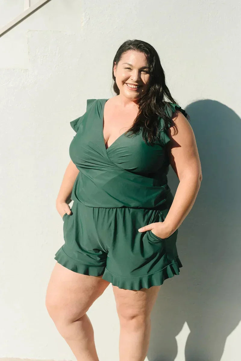 Romper costume da bagno donna, stile elegante con volant e supporto, moda mare trendy.