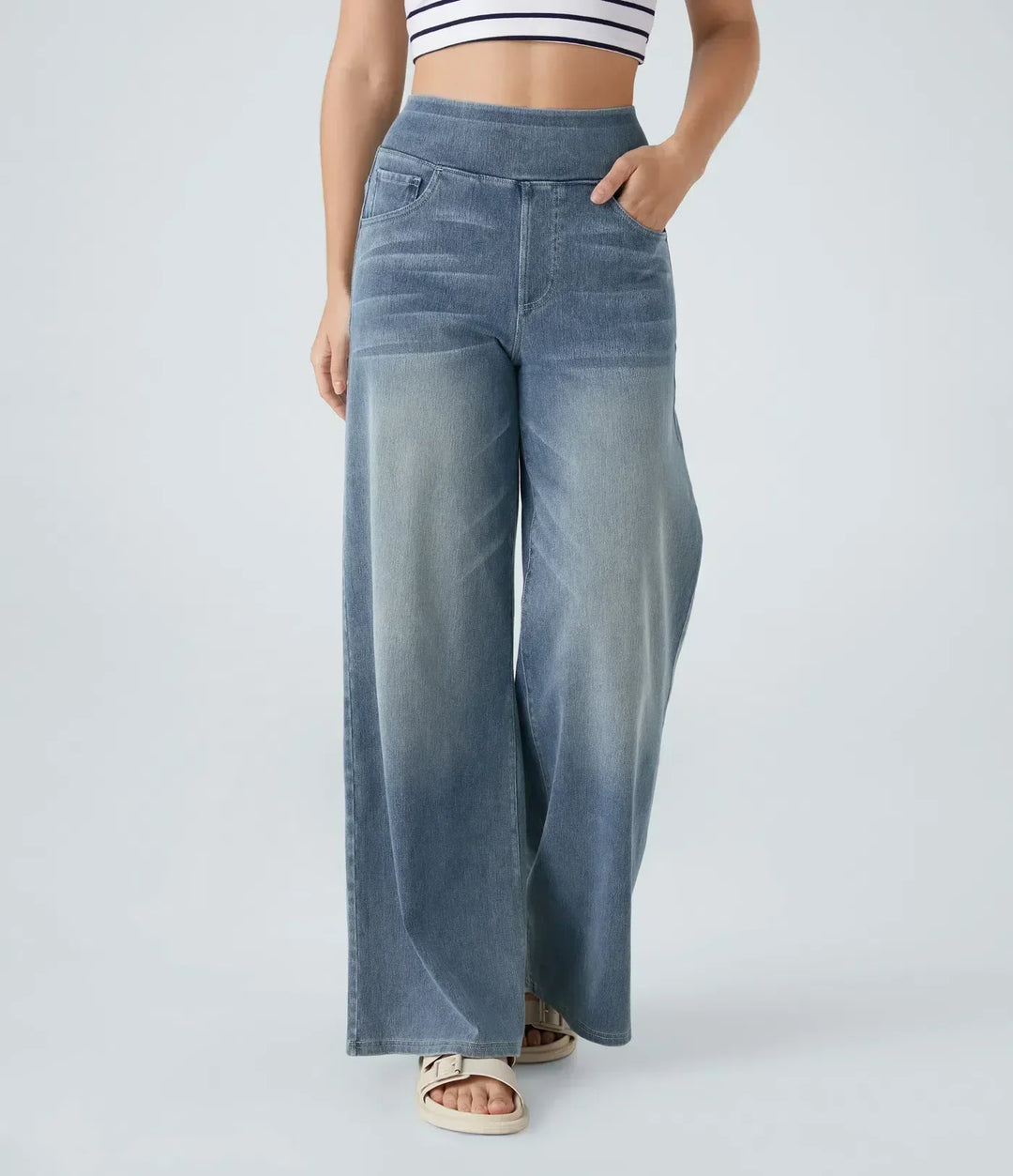 Jeans donna blu scuro vita alta, con vita elastica per massimo comfort e stile casual.