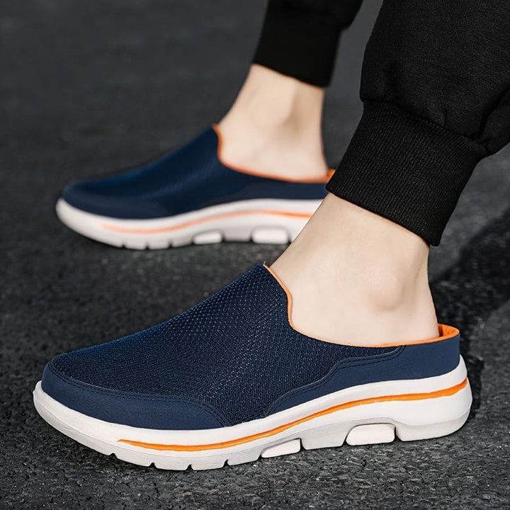 Mocassini da uomo slip-on in camoscio testa di moro, ideali per un look casual-chic e versatile.