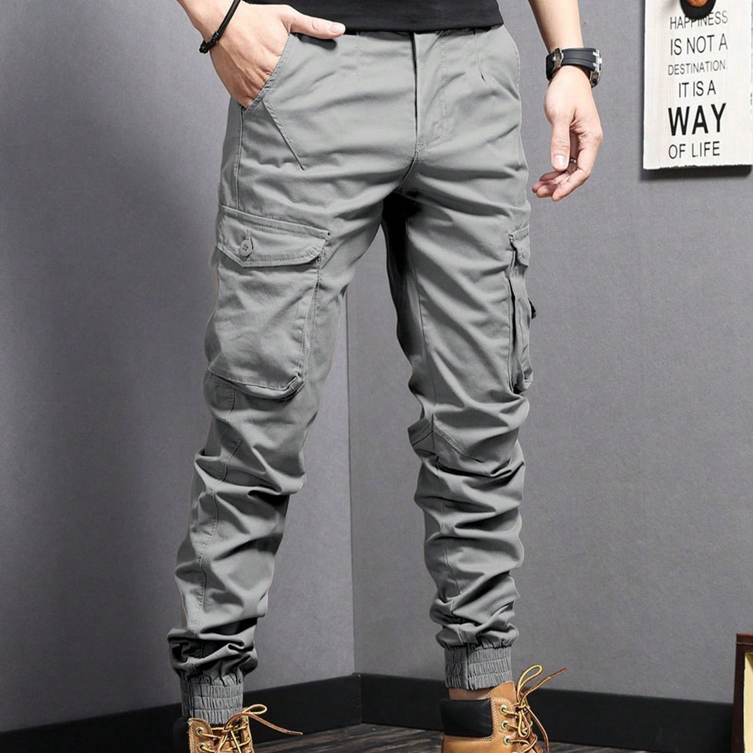 Pantaloni uomo multitasche cargo per il lavoro, con coulisse regolabile e design funzionale e robusto.