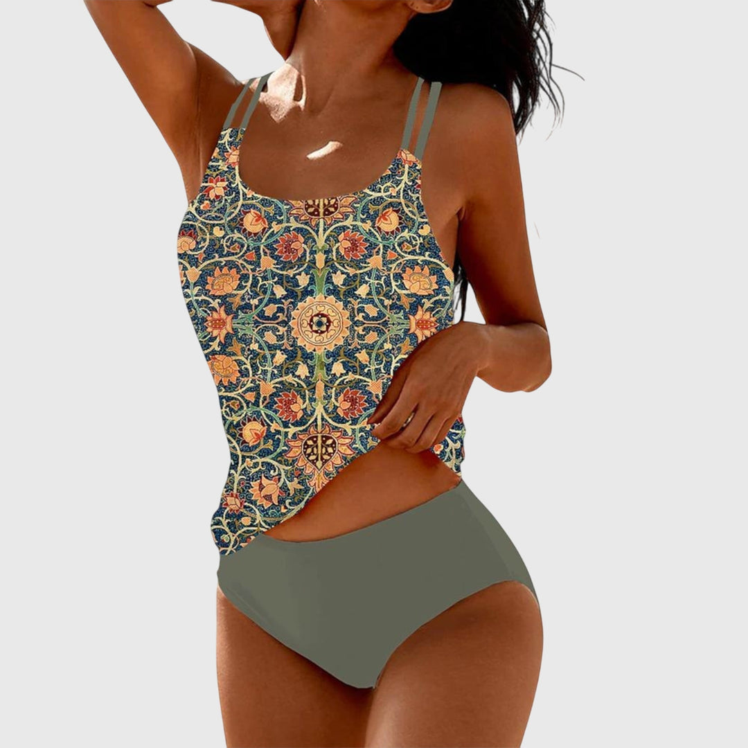 Tankini donna con top e slip alto confortevole. Stampa mandala vivace per un look estivo chic al mare.